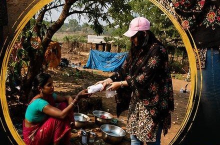Volunteer visiting rural village woman
